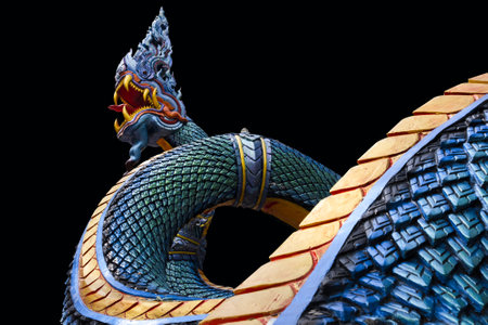 King of Nagas statue on the black background,Thailand.の写真素材