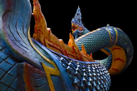 King of Nagas statue on black background, Wat Phra Kaew, Thailandの写真素材