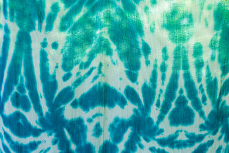 tie dyed pattern on cotton fabric.