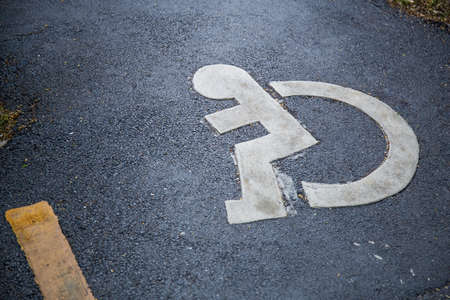 Sign for the disabled on the streetの写真素材