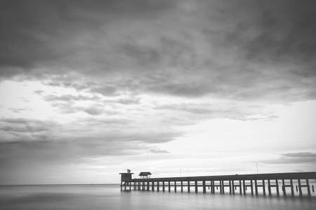 Jetty and sky, black and whiteの写真素材