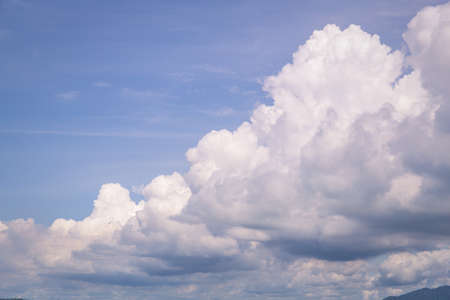 Beautiful sky and clouds floating for the background.Image with Grain.の写真素材