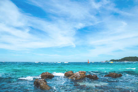 The sea and the bright sky with the passage of the ship.