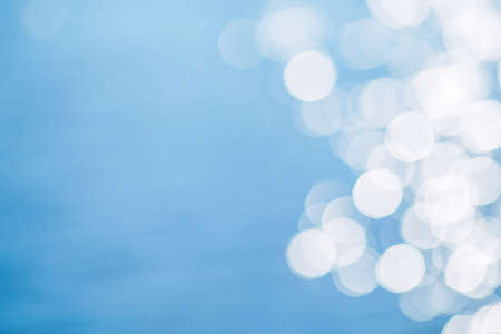 Sun light reflecting or sparkling glitter on water of sea or ocean.の写真素材