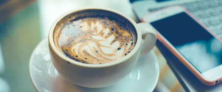 Coffee art with coffee cups and mobile phones.Web banner.