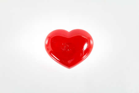 A red heart on white backgroundの写真素材