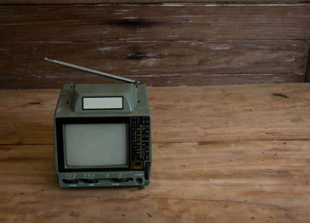 Old TV on the old wooden floor.still lifeの写真素材