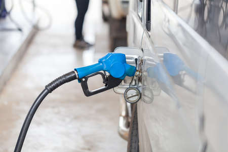 Fuel nozzle at a car service.の写真素材
