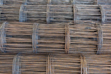 Rolls of wire mesh placed them in storage awaiting disposal