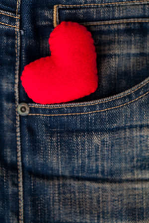 Red Heart put on an old blue jeans. Means love for denim
