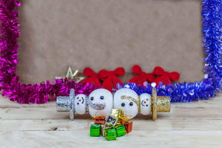 Two snowballs on wooden floor.の写真素材