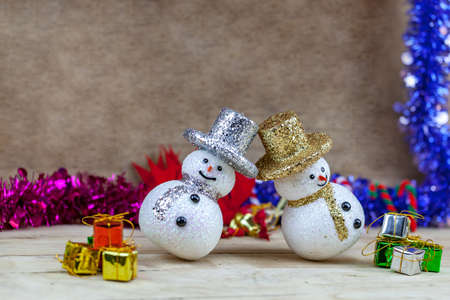Snowflakes are lying on a wooden floorの写真素材