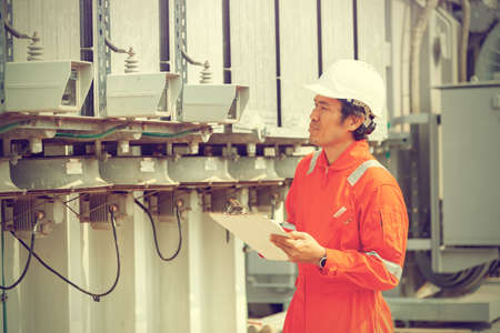 The engineer checked the electrical surge from the electrical surge counterの写真素材