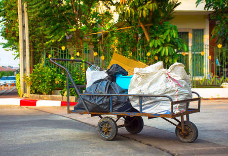 A cart  beside the  road to look for garbageの写真素材