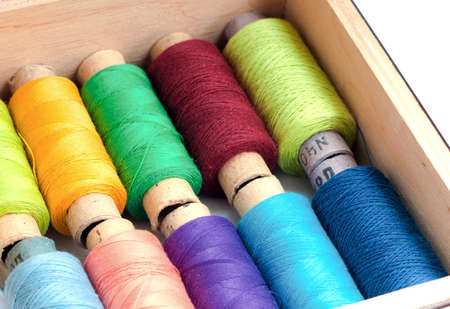 Colorful sewing threads in a box