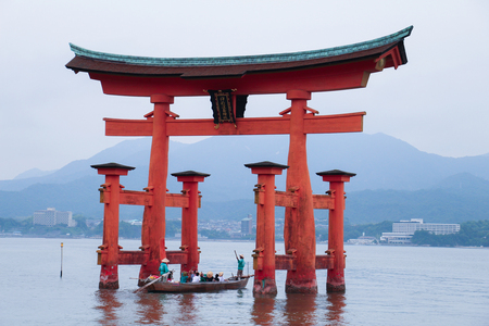 Miyajima, JAPAN - June 2015 : Itsukushima Shrine is a Shinto shrine on the island of Itsukushima , Miyajima , Japan. Best known for its "floating" torii gate. UNESCO World Heritage Site.のeditorial素材