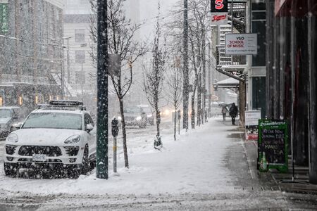 Vancouver, CANADA - 23 Feb, 2018 : Winter time with Snow storm in Downtown Vancouver, Canada