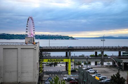 Seattle, USA - 19 May, 2017 : Seattle Great Wheel is a giant Ferris wheel at Pier 57 on Elliott Bay in Seattle, Washington. It's the tallest Ferris wheel on the West Coast of the United Statesのeditorial素材