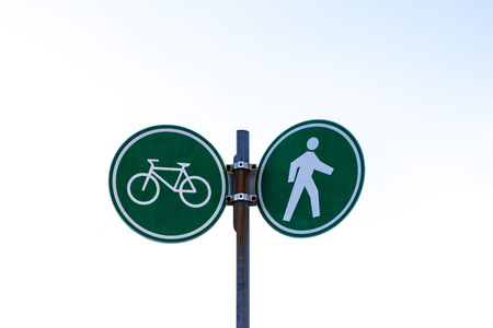 Bike and walking lane sign at Stanley Park and seawall in Vancouver, Canada.の写真素材