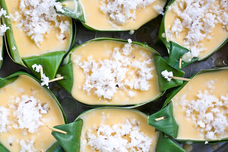 Thai dessert made ??from fruit juiceripe beef, mixed with flour and sprinkle with coconut, array in...