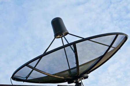 Satellite for TV early in the morningの写真素材