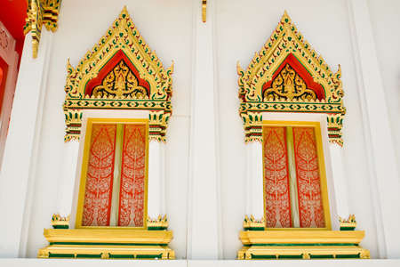 two window panels carved on the walls white.の写真素材