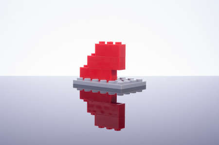 Kid's block toys studio shot with reflection.の写真素材
