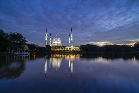 Blue Mosque also known as Sultan Salahuddin Abdul Aziz Shah Mosque during glorious sunrise.の写真素材
