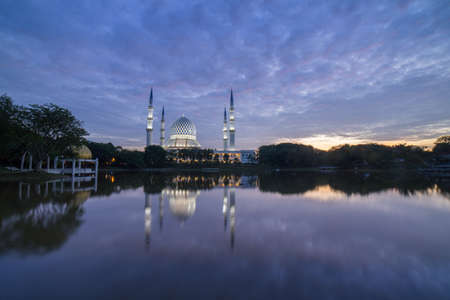 Blue Mosque also known as Sultan Salahuddin Abdul Aziz Shah Mosque during glorious sunrise.の写真素材