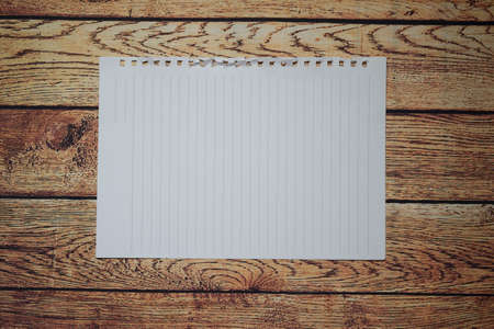 Pen and blank note paper on vintage wooden table.Background concept with copy space.の写真素材