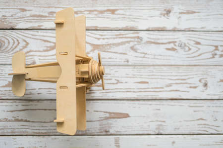 Wooden Airplane toy on vintage wooden table with copy space.Travel concept.の写真素材