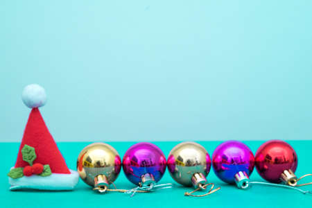 Christmas ornament balls and santa hat with copy space.Christmas deco concept for background.の写真素材