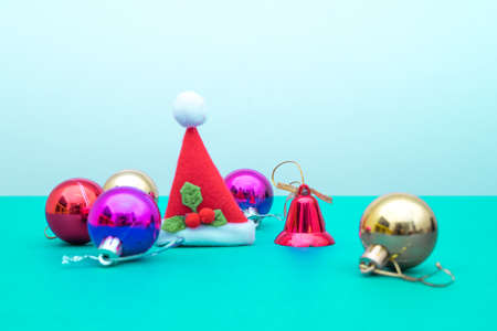 Christmas ornament balls and santa hat with copy space.Christmas deco concept for background.の写真素材