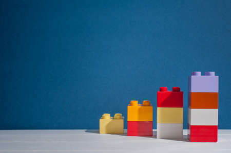 Kid's block toys forming the stair case.Early education and successful achievment.の写真素材