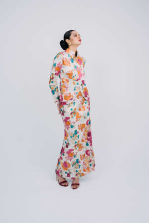 Beautiful female model wearing Asian traditional dress for Muslim woman.Eid ul fitr fashion and beauty.の写真素材