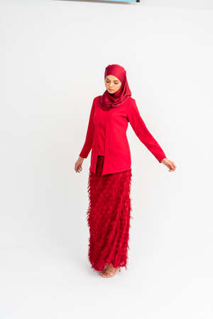 Beautiful Arab Female model wearing hijab isolated over white background.Close up shot.Hijab Fashion.の写真素材