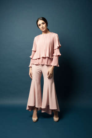 Beautiful middle east female model wearing casual yet elegant cloth.Studio shot.Professional model.の写真素材