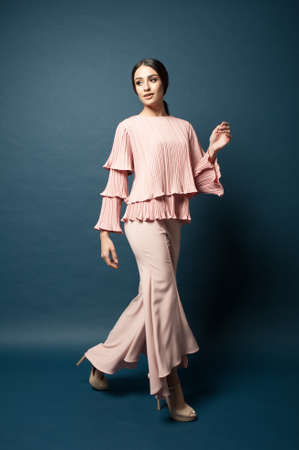 Beautiful middle east female model wearing casual yet elegant cloth.Studio shot.Professional model.の写真素材