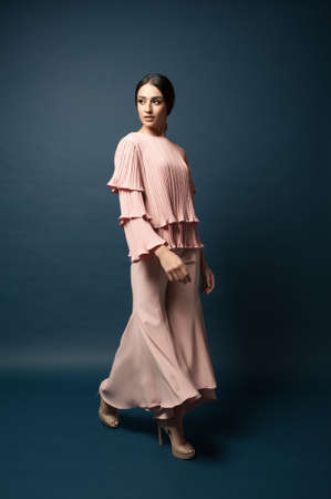 Beautiful middle east female model wearing casual yet elegant cloth.Studio shot.Professional model.の写真素材
