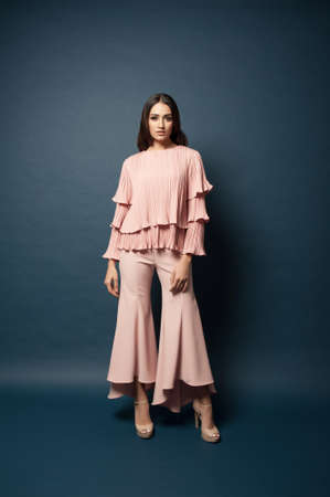 Beautiful middle east female model wearing casual yet elegant cloth.Studio shot.Professional model.の写真素材