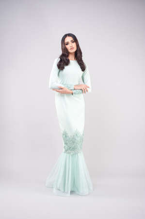 Beautiful female model wearing Malaysia traditional cloth or dress known asの写真素材