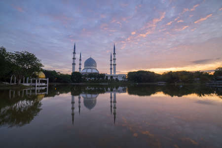 Blue Mosque also known as Sultan Salahuddin Abdul Aziz Shah Mosque during glorious sunrise.の写真素材