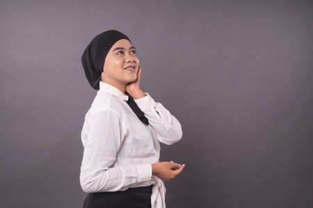 Portraiture of young asian girl wearing turban.Studio shot.の写真素材
