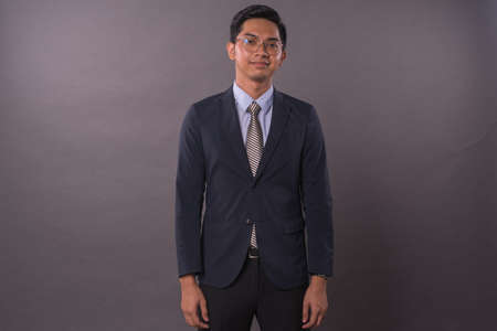 Portraiture of Young male intrepreneur or business man.Studio shot.の写真素材