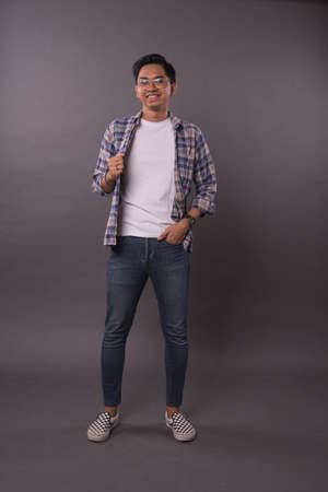 Happy of Asian boy with casual out fit.Studio shot.の写真素材