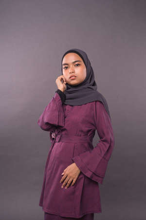 Portraiture of Muslim Girl wearing hijab.Studio Shot.の写真素材