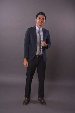 Portraiture of Young male intrepreneur or business man.Studio shot.の写真素材