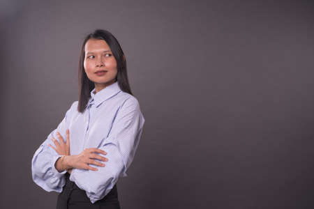 Portraiture of a asian woman with office attire.Copy space.の写真素材