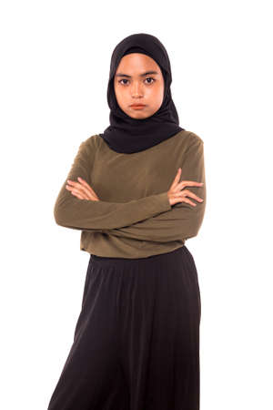 Casual Hijab Fashion.Cute Muslim girl with casual dress and hijab isolated over white background.