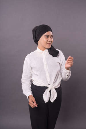 Portraiture of young asian girl wearing turban.Studio shot.の写真素材